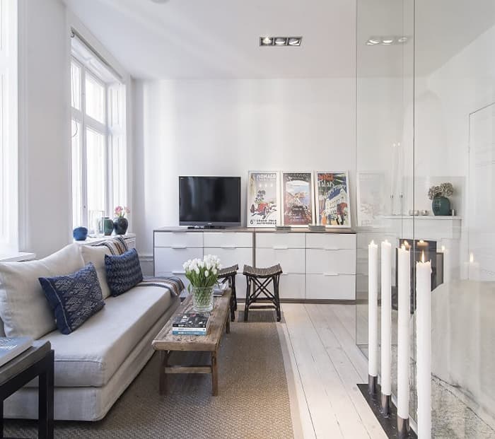 Nên xây vách ngăn phòng khách và bếp bằng tường gạch, gỗ hay kính cường lực