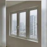 Cửa ban công nhựa lõi thép lấy sáng cho phòng khách